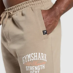 Fashion Gymshark Trophy Graphic Joggers CementBrown